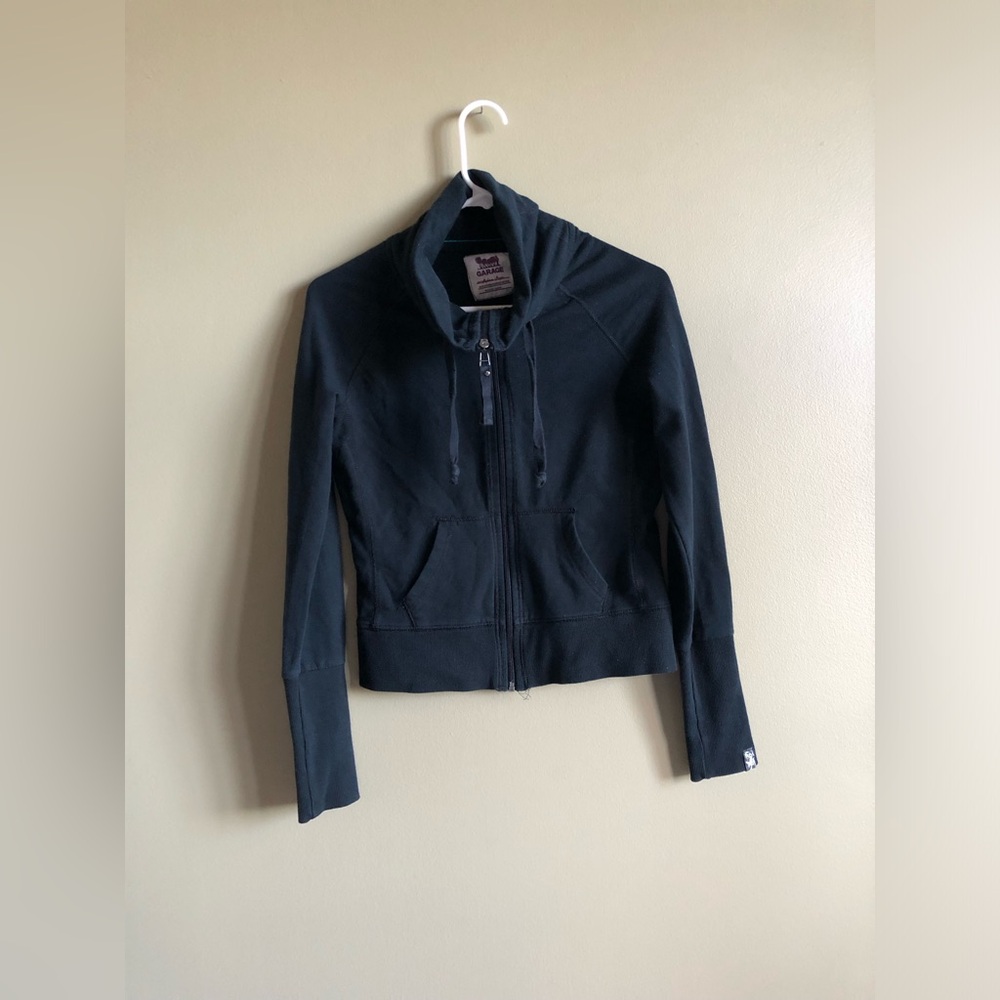 Garage Women’s black zip up fired sweater size Medium